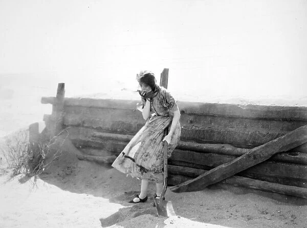 LILLIAN GISH (1893-1993). American actress. In the dramatic sandstorm scene from The Wind (MGM 1928)
