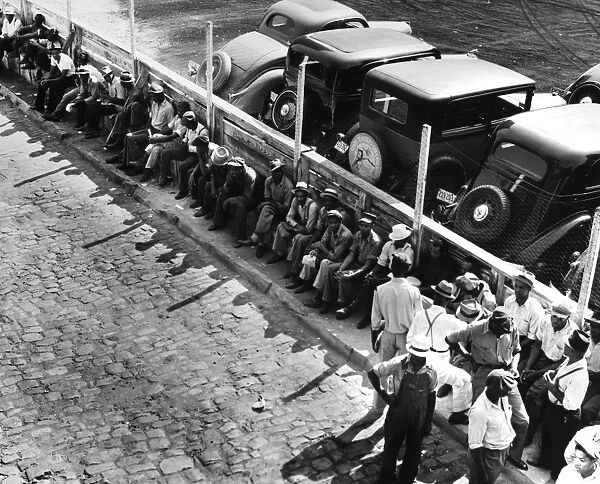 MEMPHIS: UNEMPLOYED, 1938. Part of the daily lineup of unemployed men waiting outside