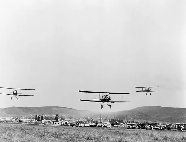 MEXICAN AIR FORCE, 1942. Training aircraft taking off from a military air base in Mexico