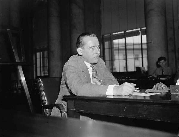 MILO PERKINS (1901-1964). American bureaucrat. Photographed appearing before the Senate Education