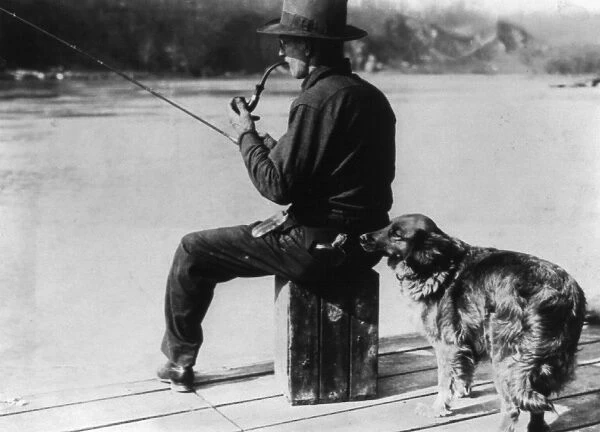 PROHIBITION, 1922. A dog trained to detect liquor sniffs at a flask in the back