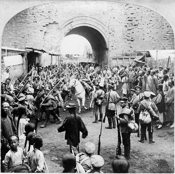 RUSSO-JAPANESE WAR, c1905. Russian soldiers passing through the gates of Mukden