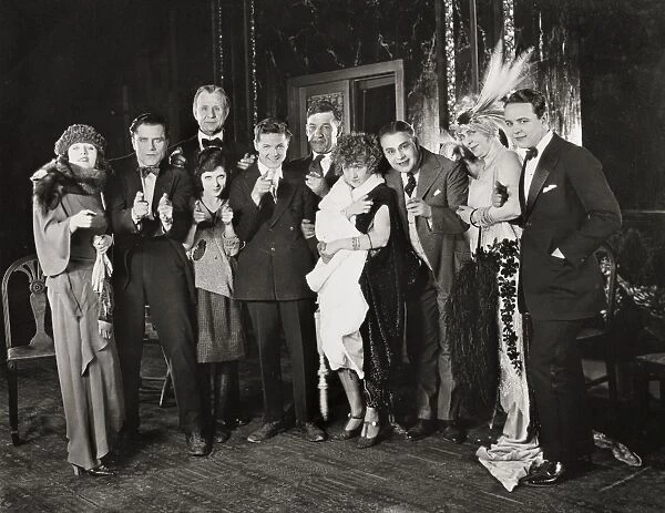 SILENT FILM STILL. Betty Compson, Bert Lytell, Charles Ogle, Mac McAvoy, Gareth Hughes, Walter Long, Kathleen Clifford, Jed Prouty, Mayme Kelso and Robert Agnew in a scene from Kind In