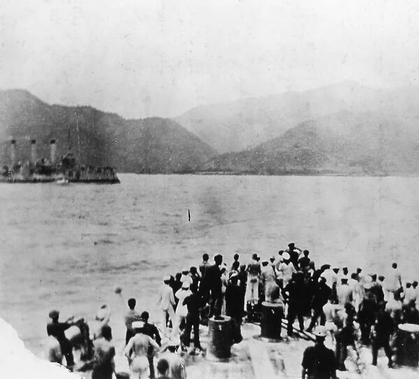 THE SPANISH-AMERICAN WAR. Sailors on the USS Oregon watching the Spanish cruiser