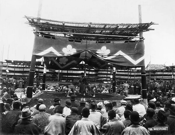 SUMO WRESTLERS, c1900. An outdoor sumo wrestling match in Japan, c1900