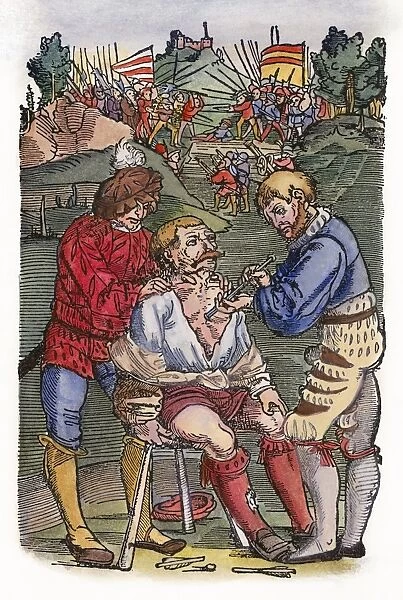 A surgeon removing an arrow from a wounded soldier. Woodcut from an edition of Hans von Gersdoffs Feldtbuch der Wundartzney (Guide to Surgery), Strassburg, Germany, 1540