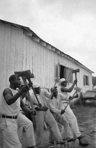 TEXAS: PRISONERS, 1934. Lightnin Washington, an African American prisoner, singing