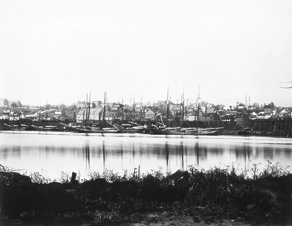 WASHINGTON, D.C., 1865. The waterfront in Georgetown, Washington, D.C., on the Potomac River