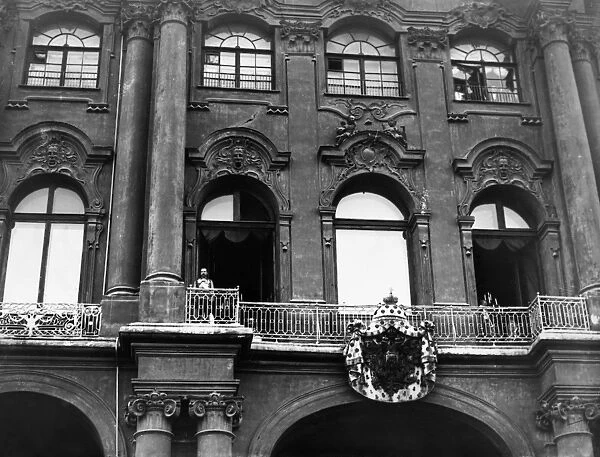WINTER PALACE, 1914. Czar Nicholas II of Russia standing on the balcony of the