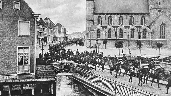 WWI: GHENT, c1914. Belgian cavalry passing through Ghent, Belgium, after defending