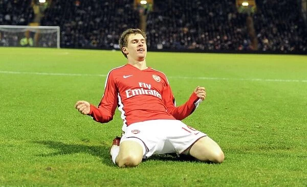 Aaron Ramsey celebrates scoring the 3rd Arsenal goal. Portsmouth 1: 4 Arsenal