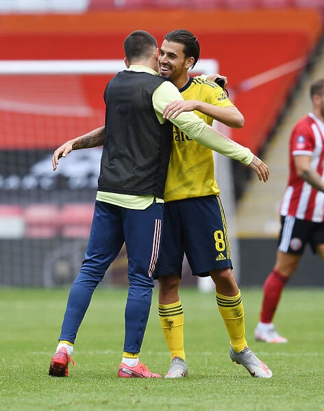 Arsenal Celebrate FA Cup Quarterfinal Victory Over Sheffield United: Dani Ceballos and Hector Bellerin Embrace
