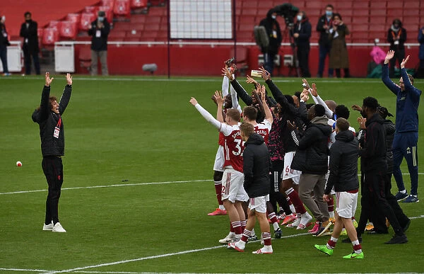 Arsenal Reclaims Premier League Title: David Luiz and Team Celebrate Triumph over Brighton & Hove Albion