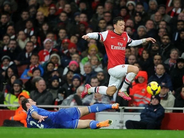 Mesut Ozil Evades Branislav Ivanovic: Intense Moment from the Arsenal vs Chelsea Clash (2013-14)