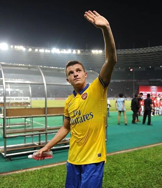 Thomas Eisfeld Waves to Arsenal Fans in Indonesia after Dream Team Match