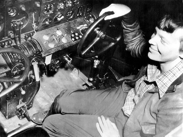 Amelia Earhart at control panel before test flight