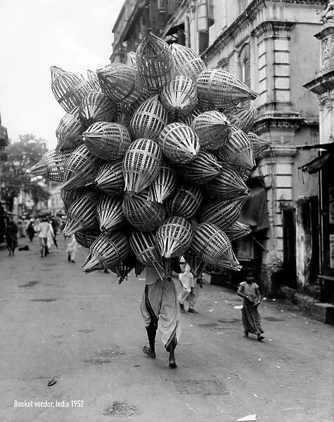 CAS 00502. asia, india, bombay, vendor of baskets, 1952