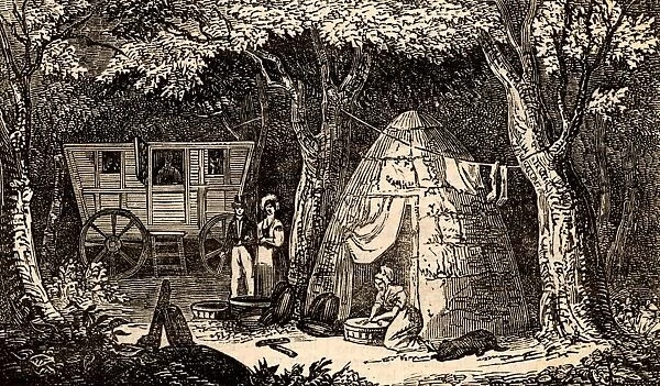 Charcoal burners caravan and cabin in a wood in the Hythe region of Kent, England