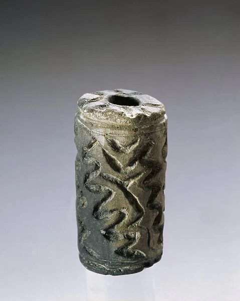 Discoidal ceramic artifact (pintadera or clay stamp), from Maliq