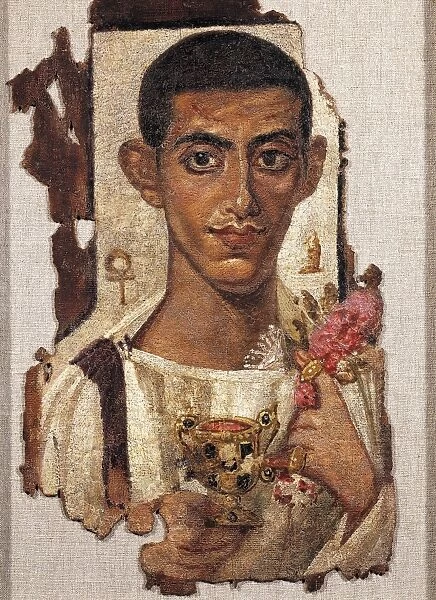 Egyptian civilization, Portrait of young man holding ciborium and flowers, Distemper painting on wood, From Al Fayyum, Egypt