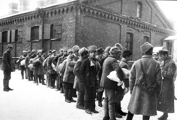 Formation of a regiment made up of poor villagers in the courtyard of their barracks in 1918 during the civil war, petrograd