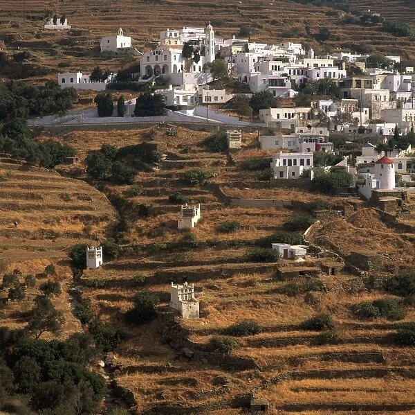 Greece, Tinos, Triandaros, village of whitewashed buildings on tiered hillside
