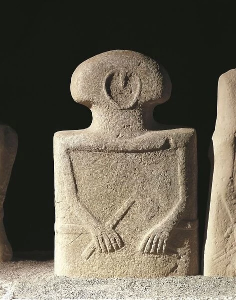 Group C, Filetto I, stone stele statue depicting male figure with javelins