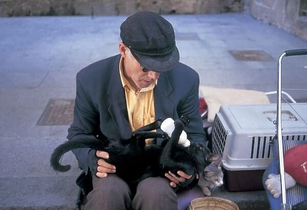 Man with His Cats. Rambla. Barcelona. Spain