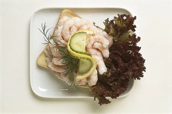 Norway, Friske Reker, large prawns garnished with parsley, served with lemon slices, mayonnaise, and slices of Norwegian bread