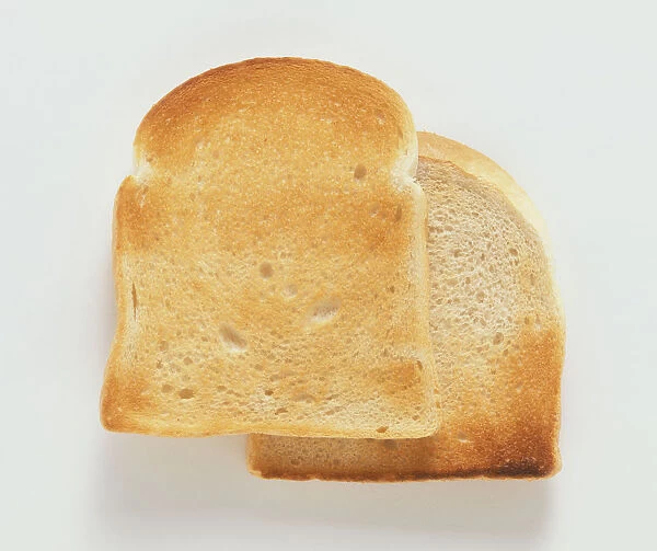 Two pieces of toast, one overlapping the other