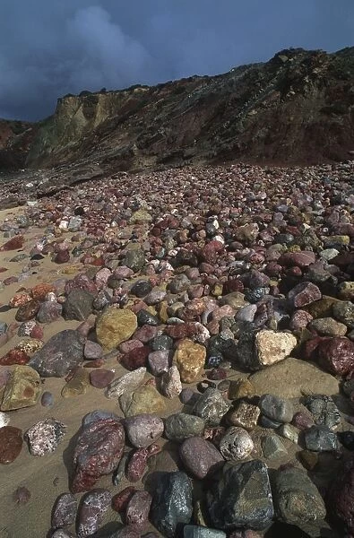 Portugal, Algarve, coloured pebbles at low tide on Atlantic coast