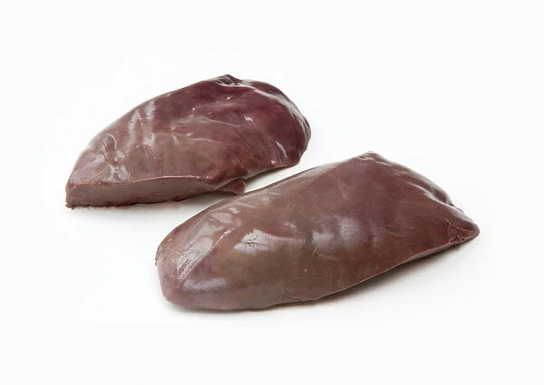 Two raw lambs livers, close-up