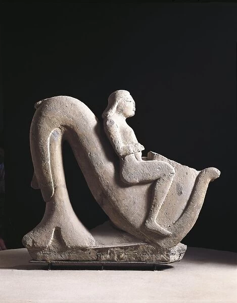 Sculpture in nenfro (grey tufa) depicting a youth riding a hippocampus (sea-horse) from Vulci, Montalto di Castro, Viterbo Province, Italy