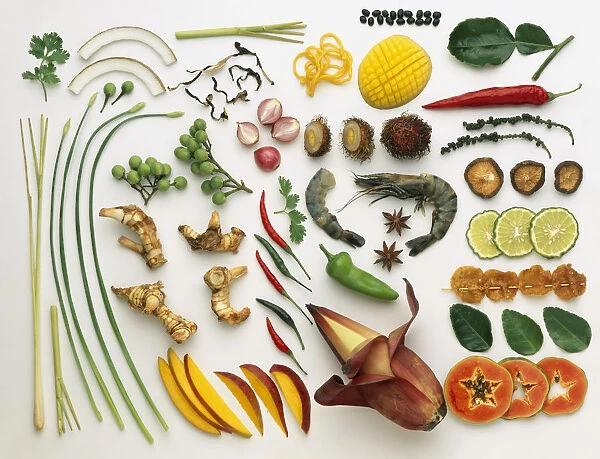A selection of ingredients used in oriental cookery, including Chinese chives, turmeric, tropical fruit, chillies