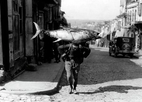 A Turkish Fisherman Returns With His Booty. 1920-30