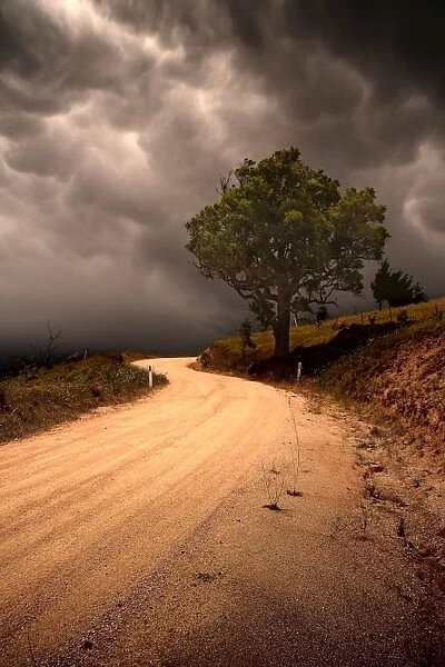 Country Road Against Dark Clouds