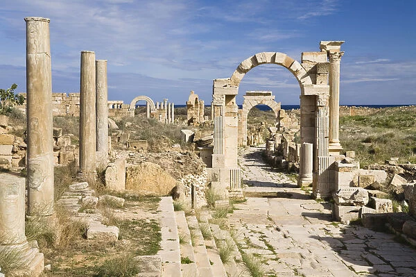 Arch of Trajan on Via Trionfale, Arch of Tiberius in the back, Leptis Magna, Libya, North Africa