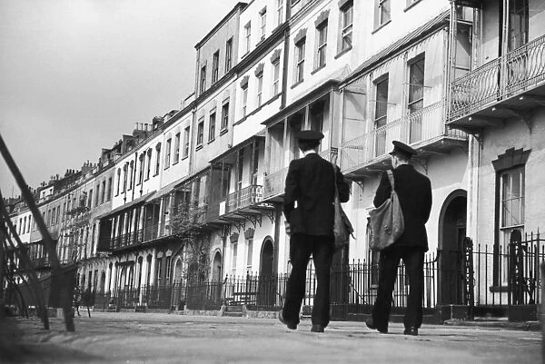 Bristol. Two postmen stroll down Royal York Crescent in Bristol, 29th May 1954