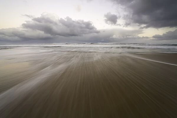 Clouds, surf, beach, Great Otway N. P. Australia
