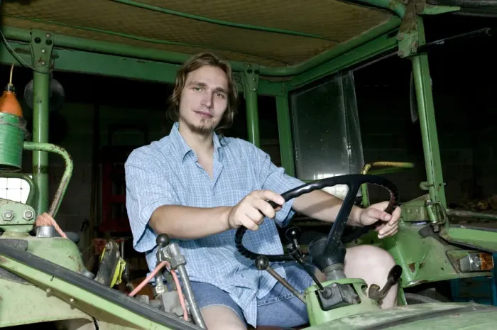 Framed Print : Farmer on a Tractor Print