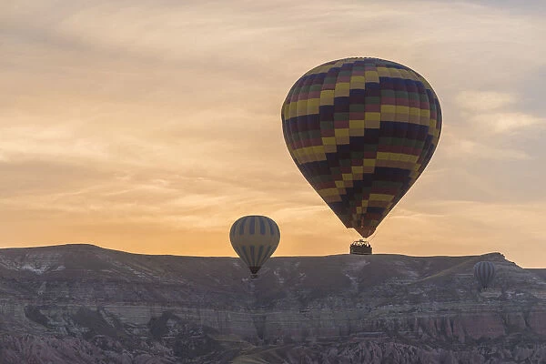 Hot air balloon flying sunset, Cappadocia, Turkey