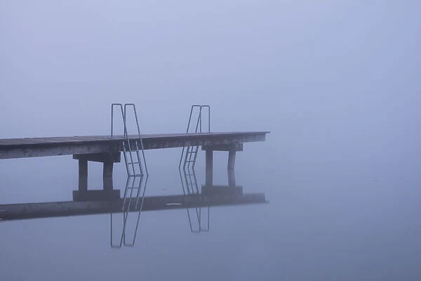 Jetty in the autumn mist, Lake Mindelsee, Baden-Wuerttemberg, Germany, Europe