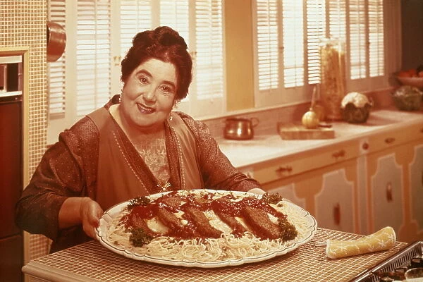 OBESE, ITALIAN WOMAN WITH PLATE OF PASTA