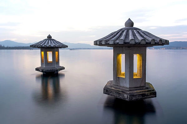 A pair of stone lanterns on the West Lake, Hangzhou