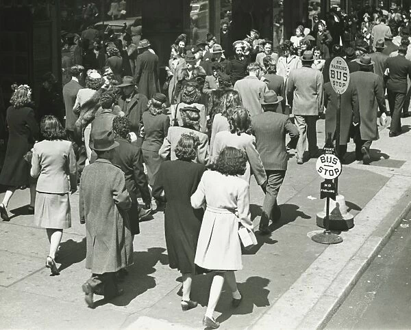 People walking on street, (B&W), elevated view