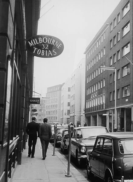 Savile Row. Two men walking down Savile Row in London, 1965