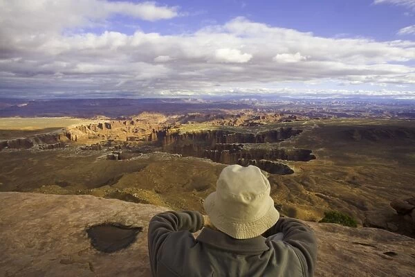 USA, Utah, Canyonlands National Park, man above canyon, rear view