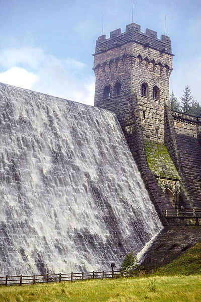 Water flowing over the Derwent Dam in the Peak District National Park