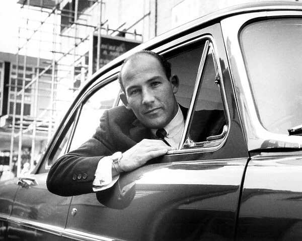 Famous racing driver Stirling Moss, who was banned from driving for 12 months