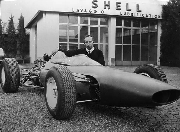 New Ferrari Formula One. Modena, Italy : British race ace John Surtees poses